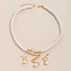 Juego de collar y pendientes de perlas naturales
