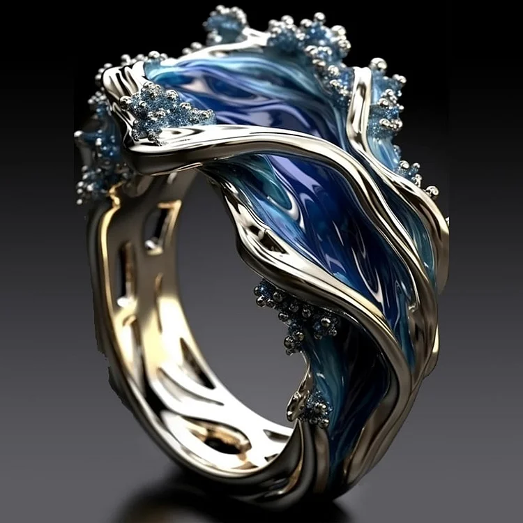 Anillo vintage de oro con las olas del mar